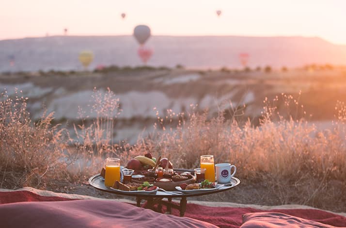 Savour sunrise breakfast in Cappadocia's breathtaking valley