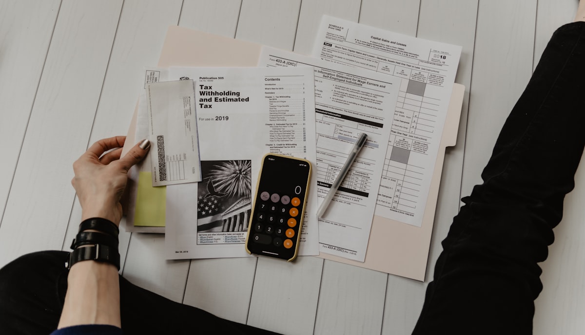 A calculator next to hotel keys — Accor bids reduce to one equation