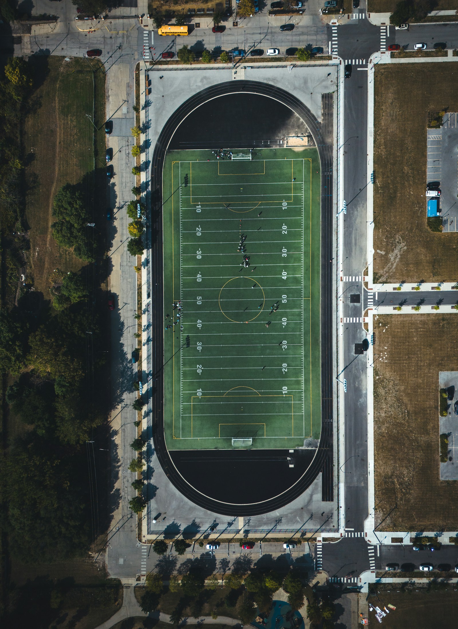 Aerial view of an empty football field — NFL Moments deliver access to exactly this kind of venue